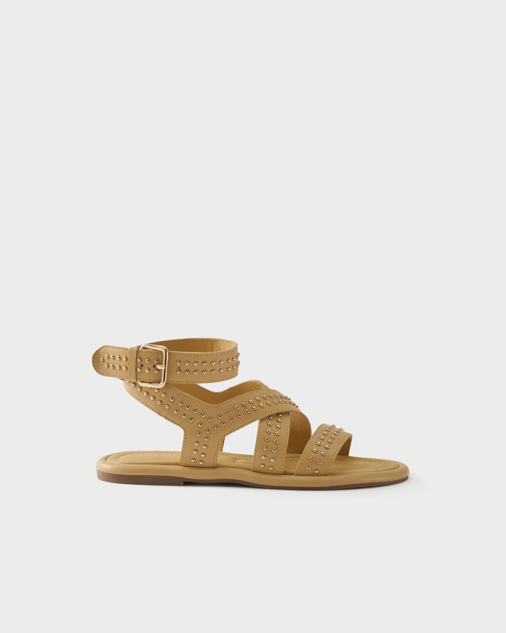 Flat sandal in leather with studs