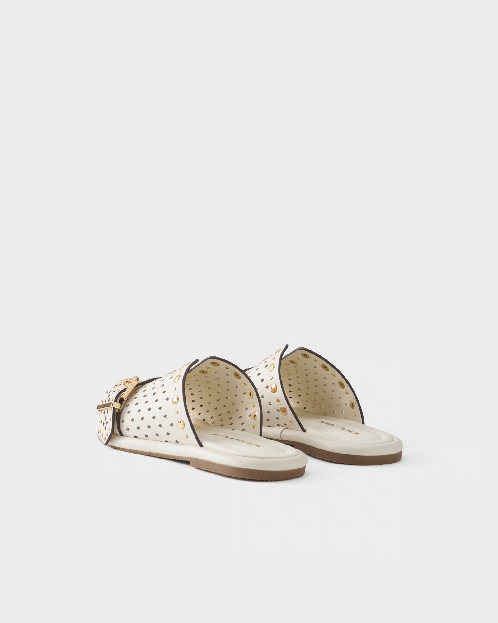 Perforated slide sandal in leather