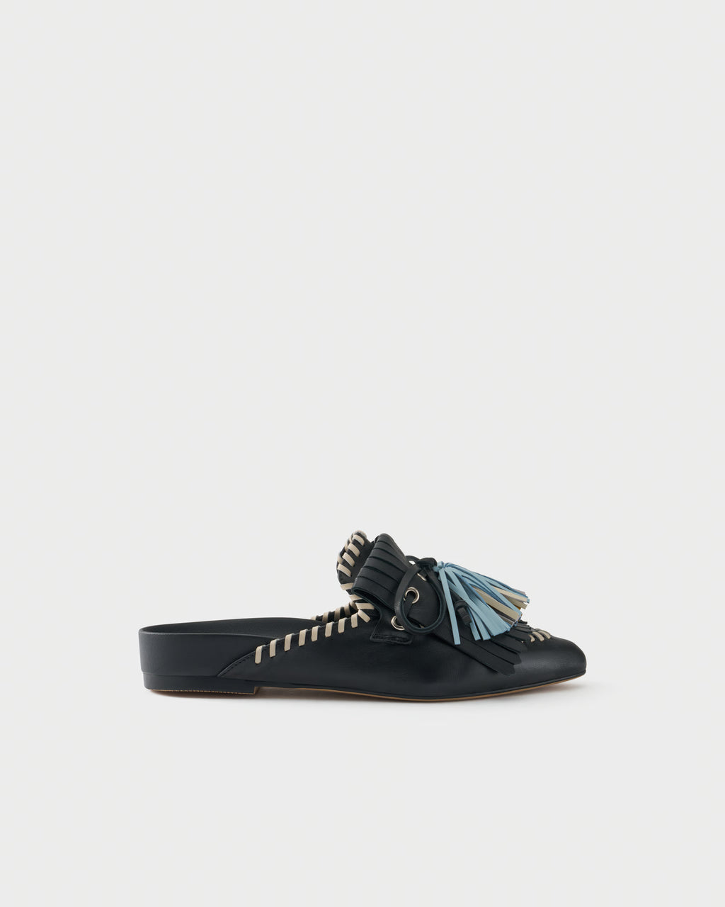Flat mule in nappa leather with fringes