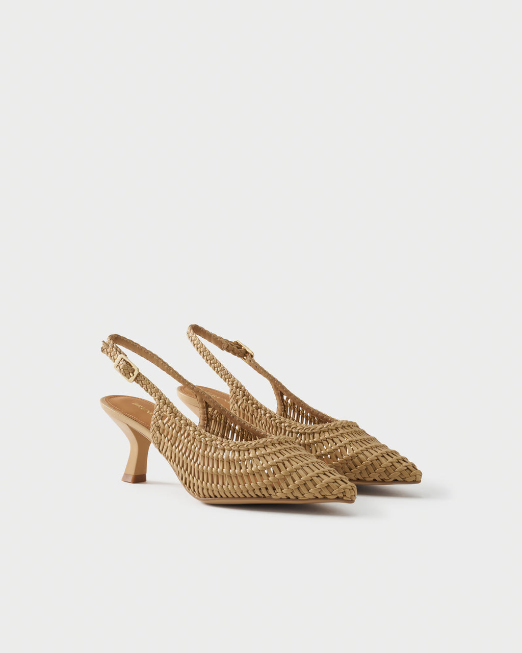 Pointed-toe slingback pump with woven upper