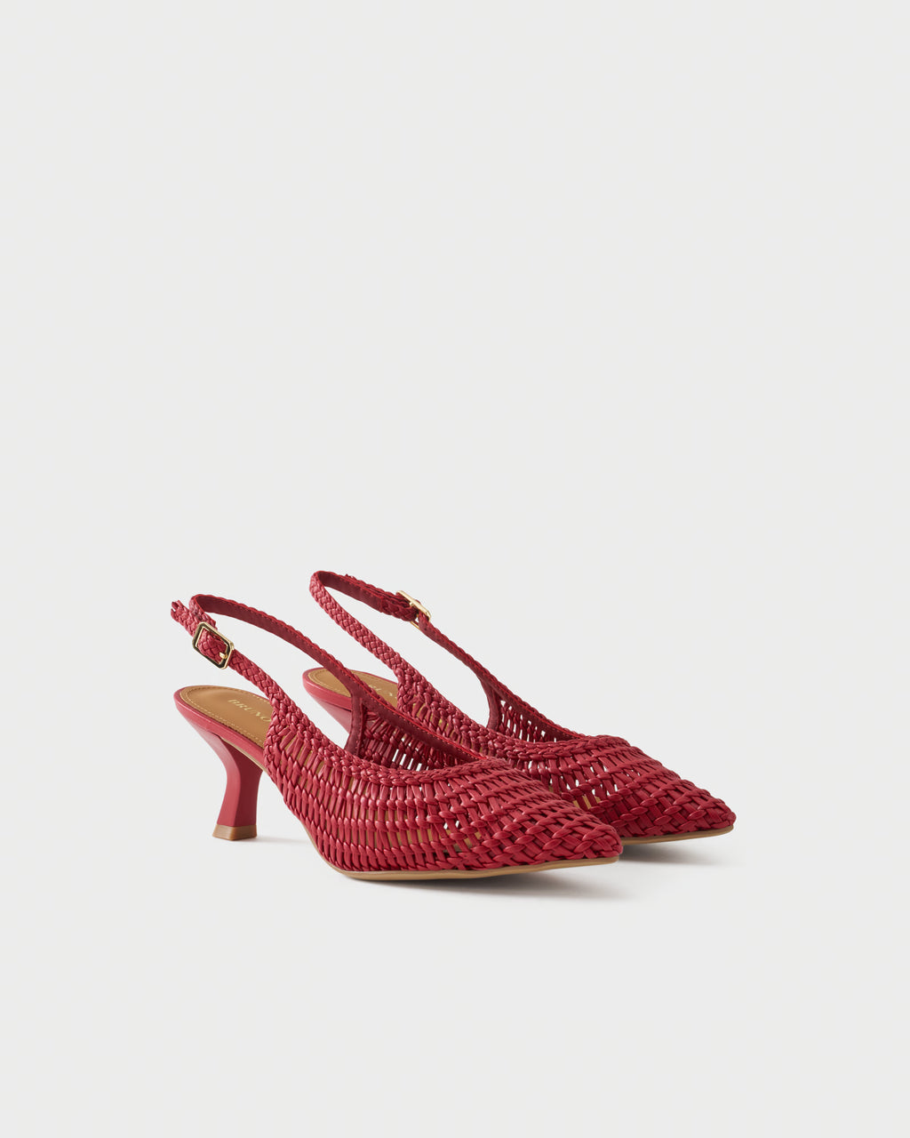 Pointed-toe slingback pump with woven upper