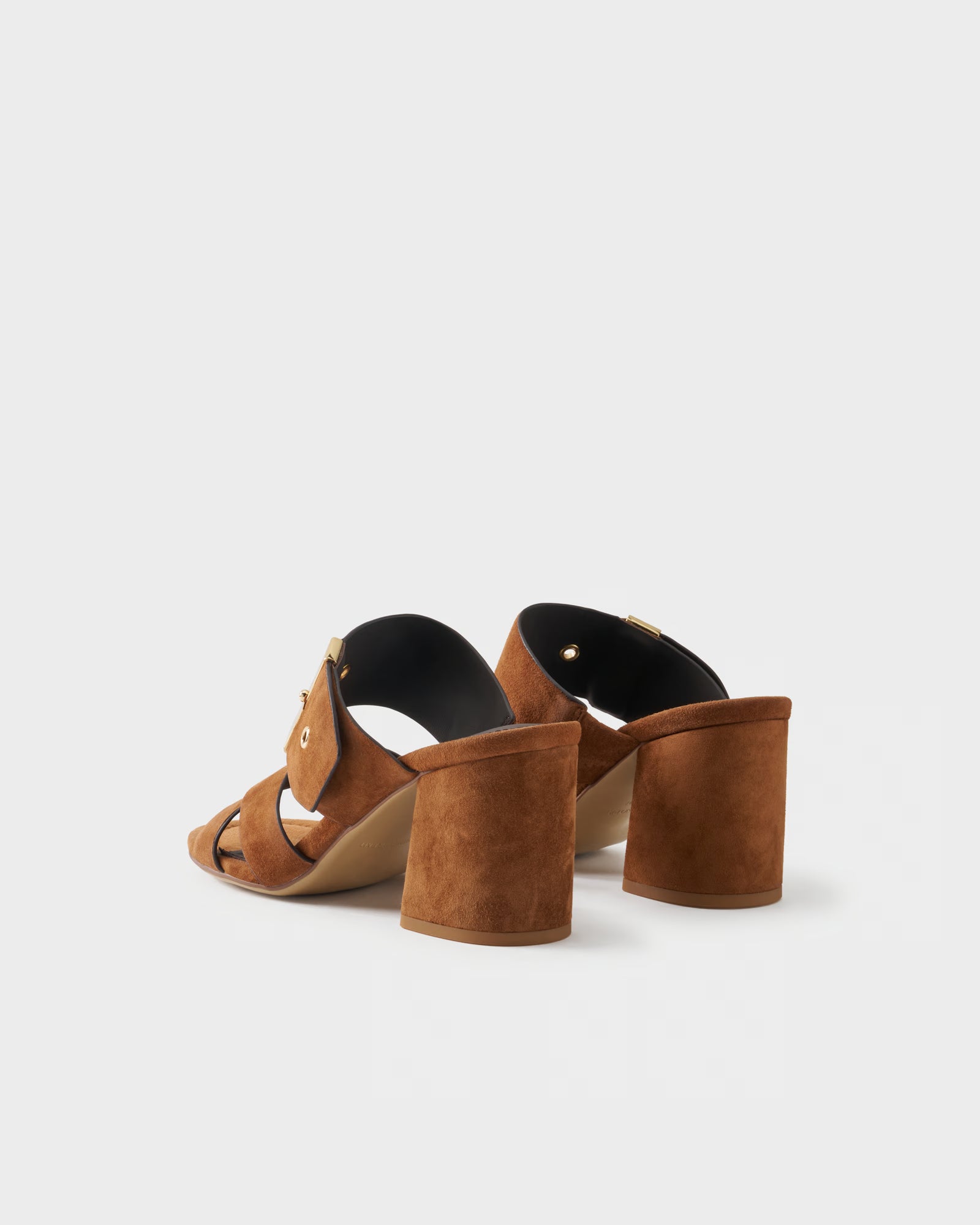 Heeled mule in suede