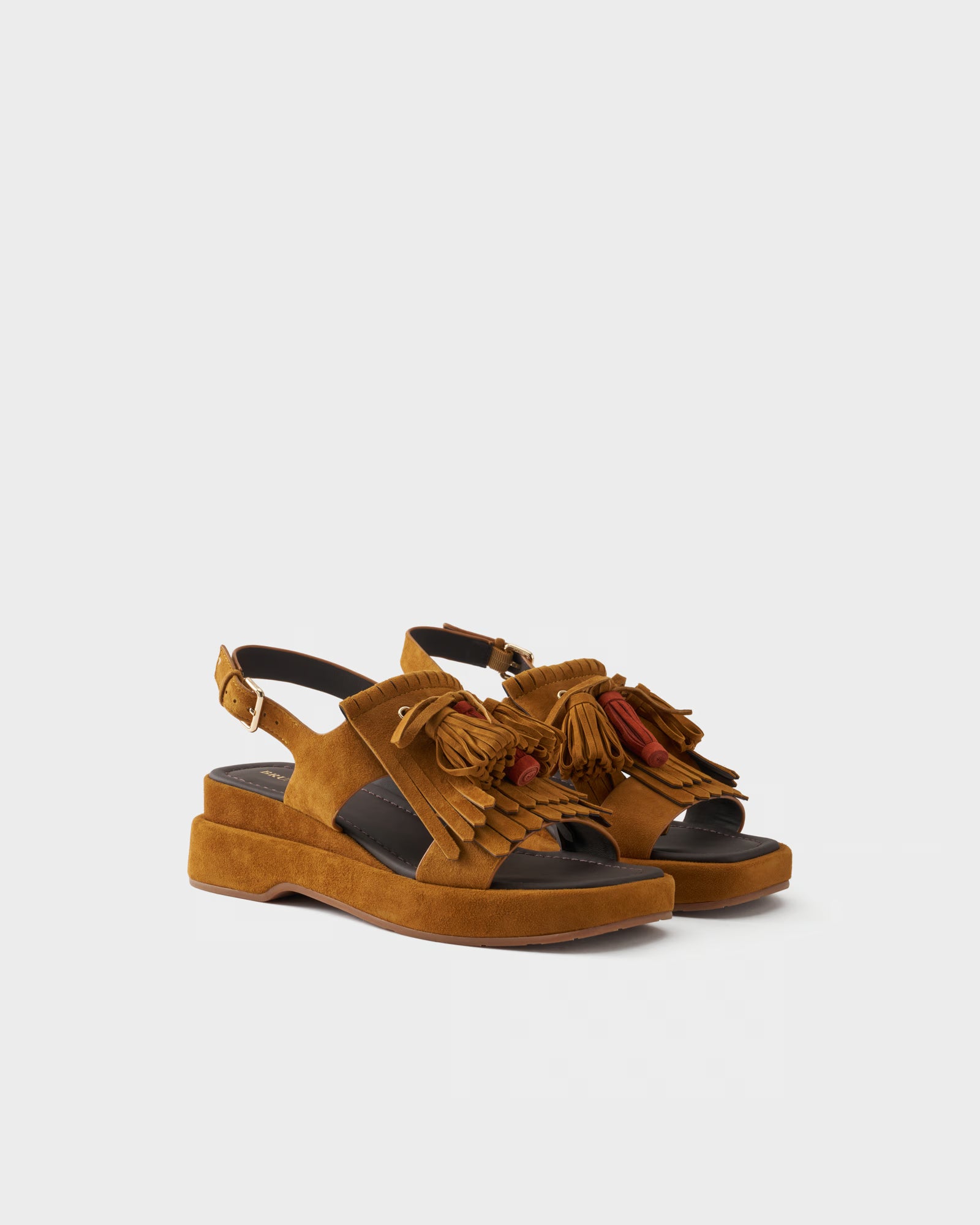Sandalo platform in pelle scamosciata con frange