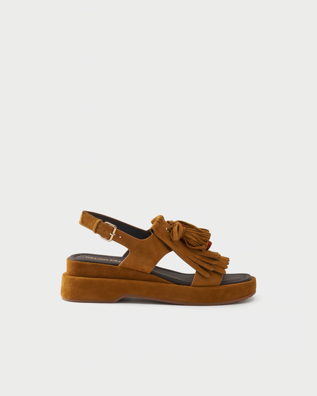 Sandalo platform in pelle scamosciata con frange