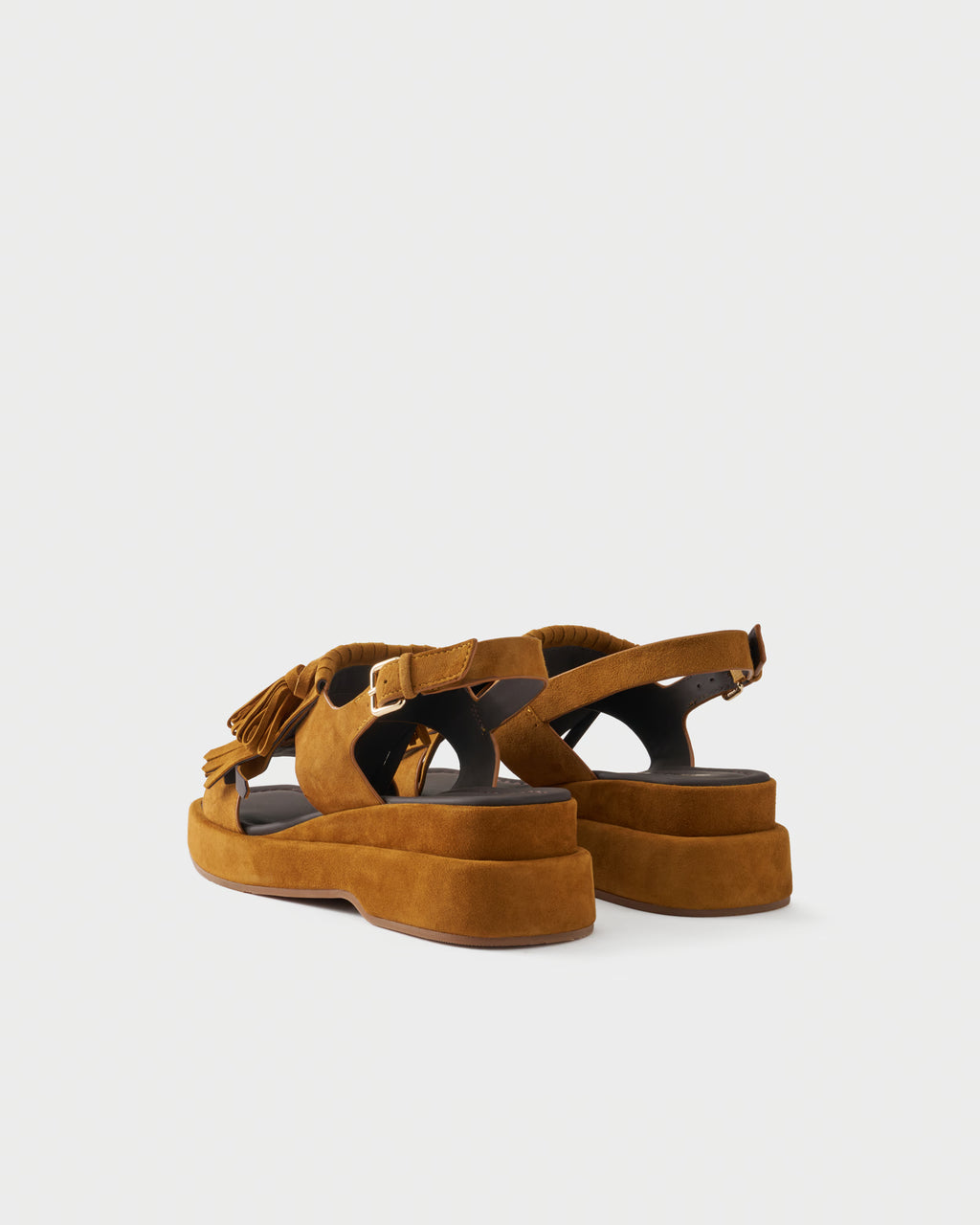 Sandalo platform in pelle scamosciata con frange