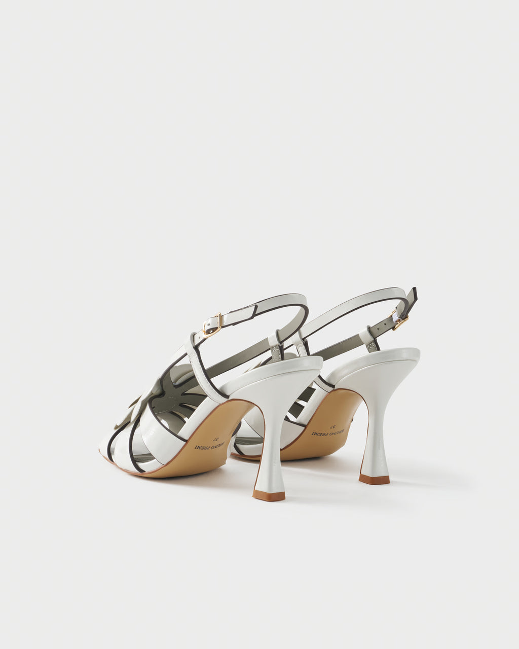 Slingback sandal in patent leather with floral embellishment