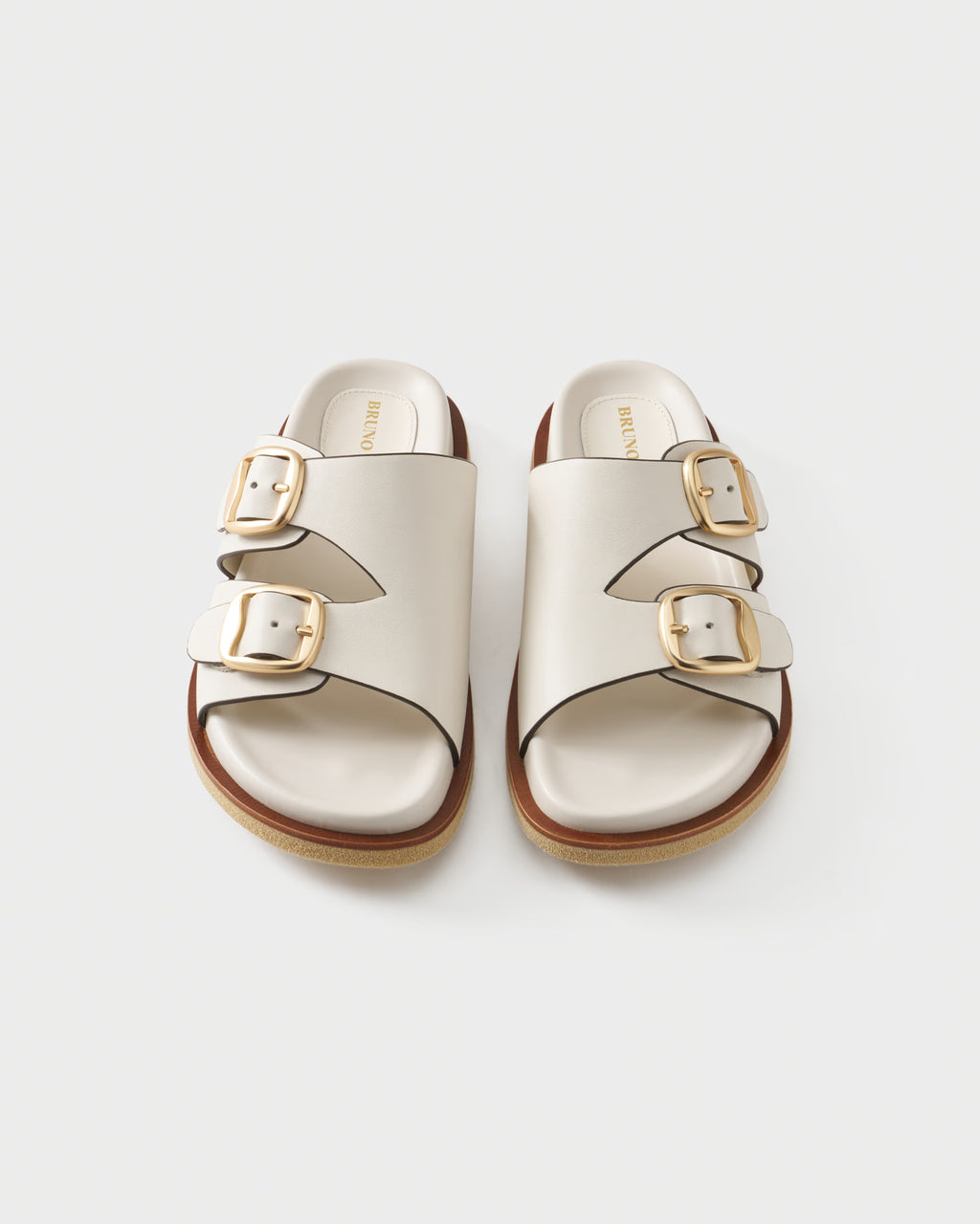 Flat slides in leather